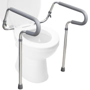 A pair of silver metal toilet safety grabber bars with gray foam padding, shown installed on a white toilet against a plain white background.