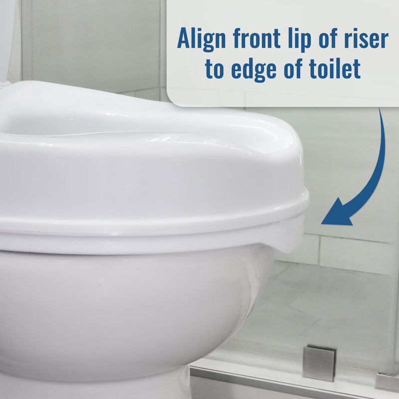 Close-up of a white toilet with a raised rim insert, shown in a bathroom setting with overlaid text reading 'Align front lip of riser to edge of toilet' and a blue arrow indicating placement.