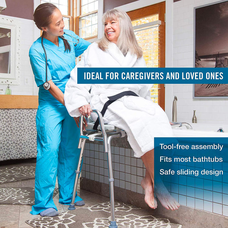 Caregiver assisting a person in a bathrobe with a tool-free assembly bathtub transfer aid.