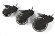 Three black caster wheels with gray wheels and silver metal axles, arranged diagonally on a white background.
