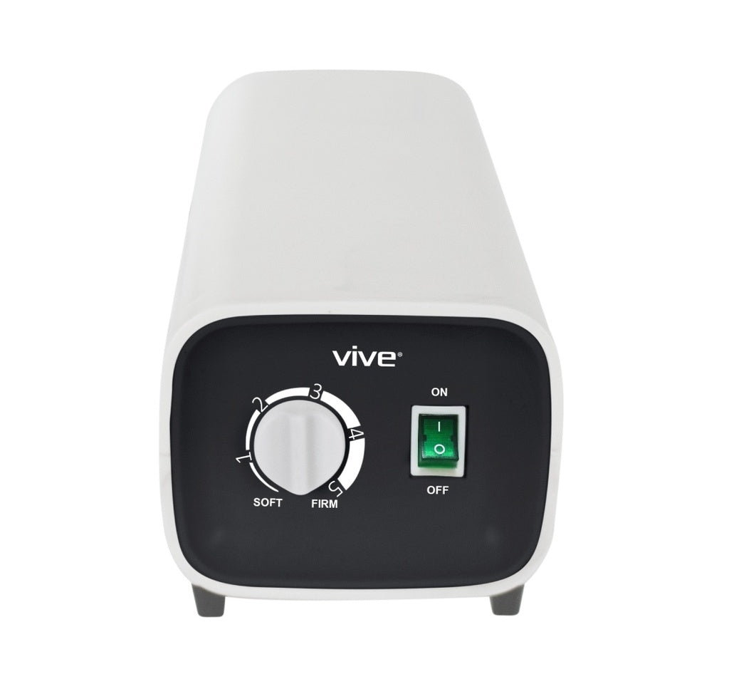 White and black electronic device with a dial and 'Vive' branding on a white background