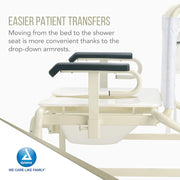 A close-up of a cream-colored Dynarex shower seat with black armrest pads, shown with promotional text about easier patient transfers and a Dynarex logo in the lower left.