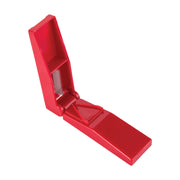 A bright red pill cutter shown open on a plain white background.