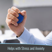 Hand holding a blue stress ball with blurred office background