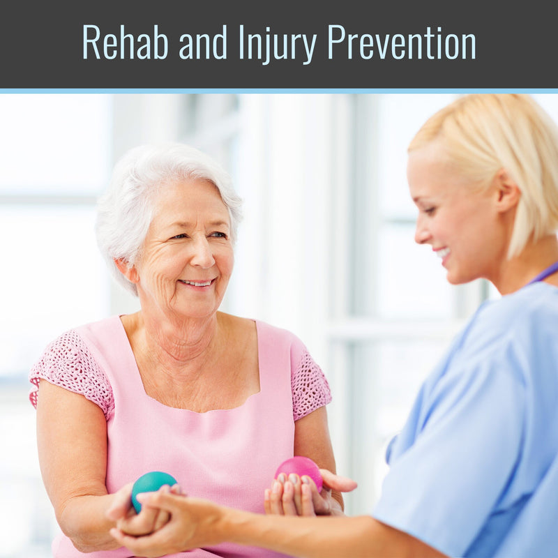 An older woman in a pink top smiles while receiving exercise balls from a blonde healthcare worker in blue scrubs, with a banner at the top reading 'Rehab and Injury Prevention'.