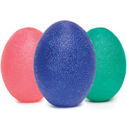 Three textured exercise balls in red, blue, and green on a white background