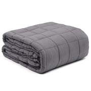 A folded gray quilted blanket with a grid pattern, shown on a clean white background.