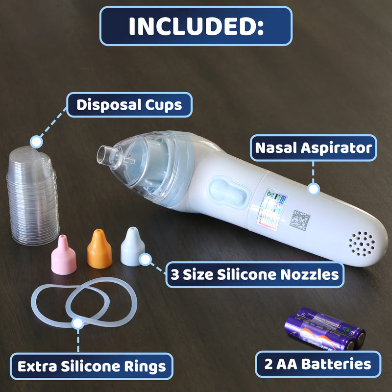 Nasal aspirator kit shown on a dark wood background with labeled included accessories: a white handheld nasal aspirator, a stack of clear disposable cups, three silicone nozzles in pink, orange, and white, extra silicone rings, and two AA batteries. Text at the top reads 'INCLUDED:'.