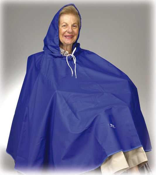 Person wearing a blue rain cape on a plain background
