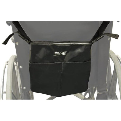 Black wheelchair storage bag attached to a wheelchair on a white background
