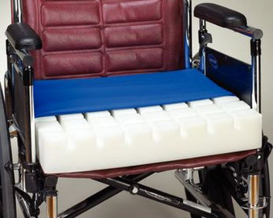 Wheelchair with a cushioned seat and backrest
