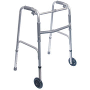 A silver aluminum rollator walker with black wheels and gray padded handles, shown on a plain white background.