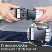 Person adjusting a belt with a convenient snap-to-close buckle on a gray shirt.
