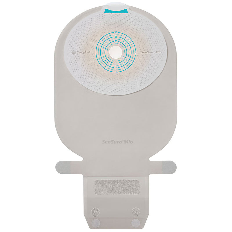 A SenSura Mito continence pad by CareFusion, shown from the back against a solid white background. The pad is light gray with a circular white and teal patterned area in the center, a small teal tab at the top, and a gray connector base at the bottom.