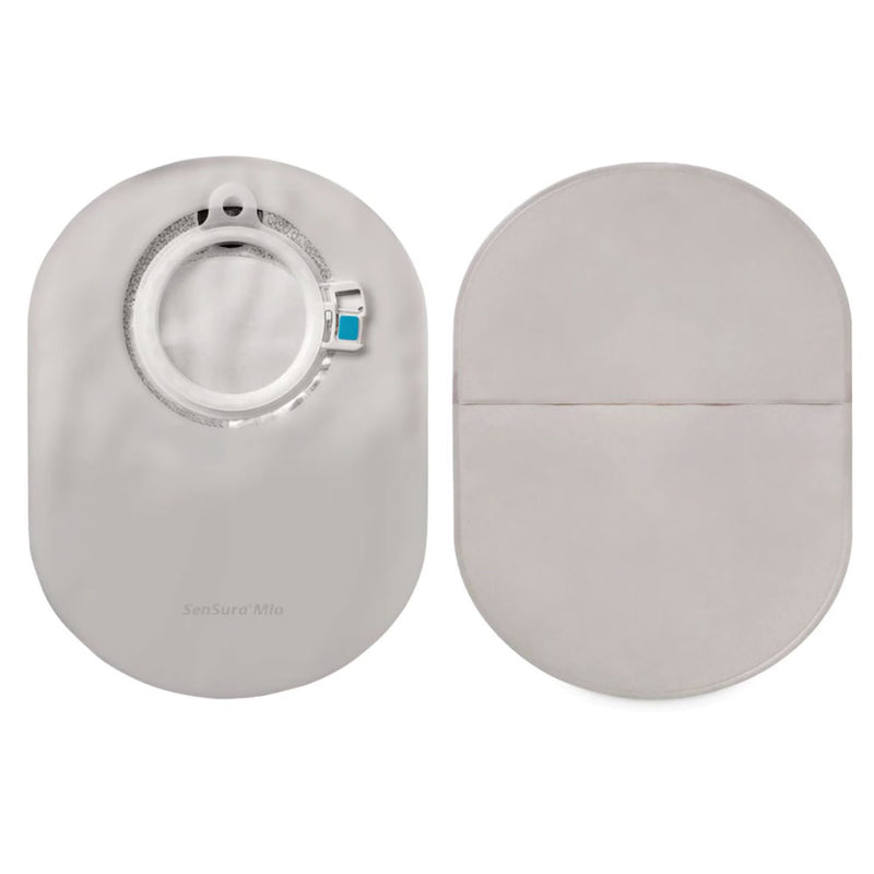 Two light gray circular adhesive pads shown on a white background, one with a circular opening and small blue accent on the left, and one plain oval on the right.