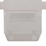 A close-up of a light gray textured panel with a rectangular velcro patch and two circular textured adhesive dots on a white background.
