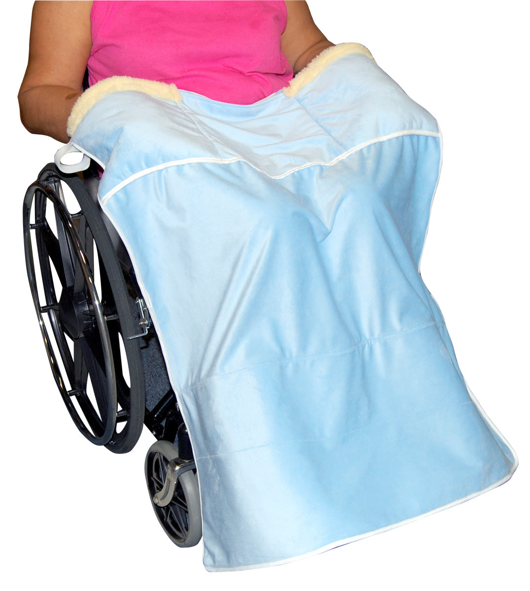 Person in a wheelchair with a light blue cover over them, wearing a pink top.