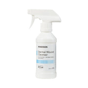 White spray bottle labeled 'Mckesson Dermal Wound Cleanser' on a white background