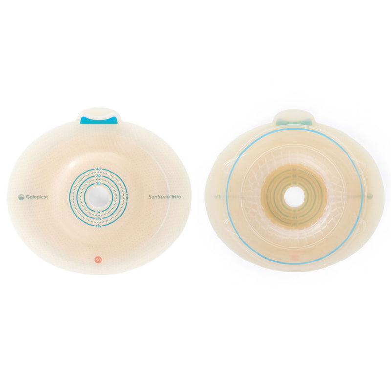 Two circular transparent medical adhesive devices shown side by side on a white background, one labeled 'CooperCare' and the other 'SanteSkin Mini'.
