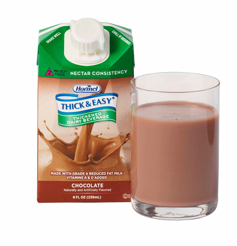 An 8 fl oz carton of HorneL Thick & Easy Chocolate Dairy Substitute next to a clear glass filled with the chocolate-colored drink, on a white background.