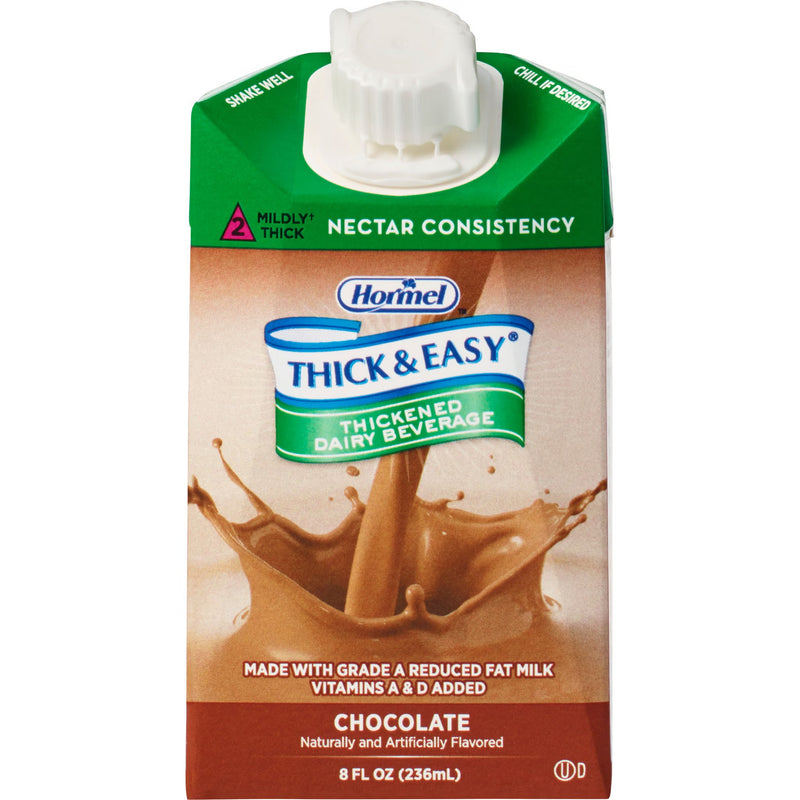 An 8 fl oz carton of Hormel Thick & Easy Chocolate Thickened Dairy Beverage, featuring a green top section, brown splash graphic, and white cap on a white background.