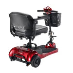 Red and black mobility scooter with basket on a white background