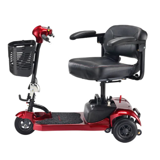 Red and black mobility scooter with a basket on a white background