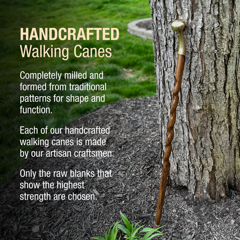 Handcrafted walking cane leaning against a tree with promotional text about traditional craftsmanship.