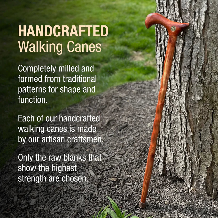 Handcrafted walking cane leaning against a tree with promotional text about traditional patterns and artisan craftsmanship.