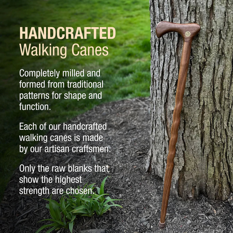 Handcrafted walking cane leaning against a tree with promotional text about its traditional craftsmanship.