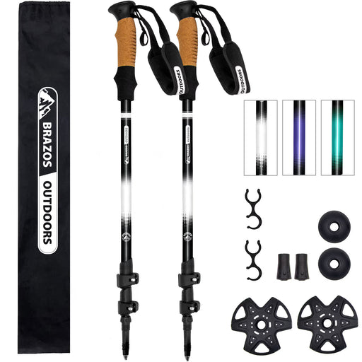 Two hiking poles with accessories and a carrying bag on a white background