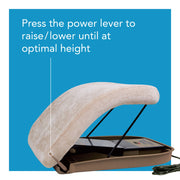 An electric adjustable headrest pillow shown on a blue background with instructional text reading 'Press the power lever to raise/lower until at optimal height.' The headrest is beige with black support rods and a brown base, and a power cord is visible at the lower right.
