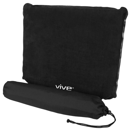 Black pillow with 'Vive' branding and a matching drawstring bag on a white background