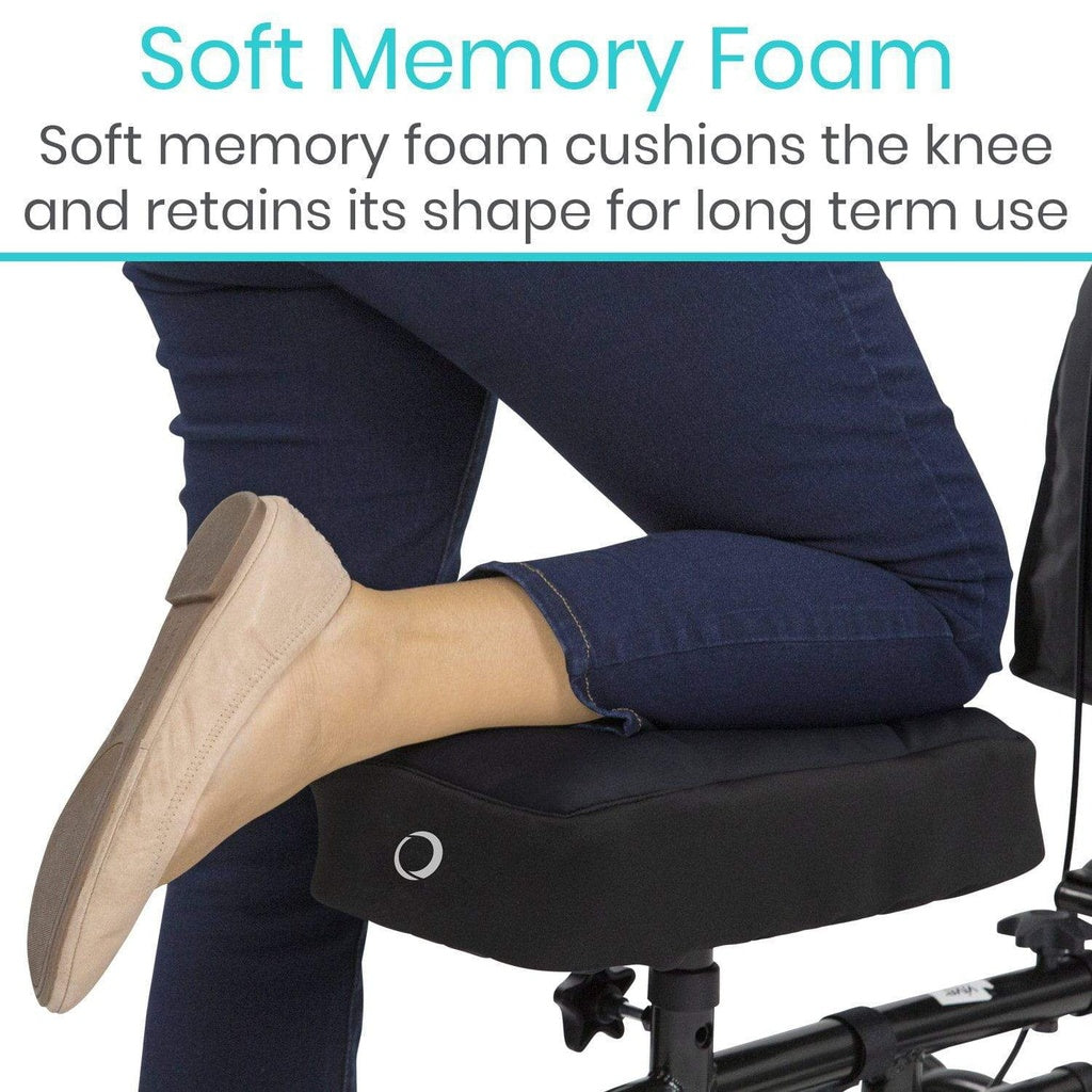 Person sitting on a chair with a soft memory foam cushion, wearing beige shoes and blue jeans.