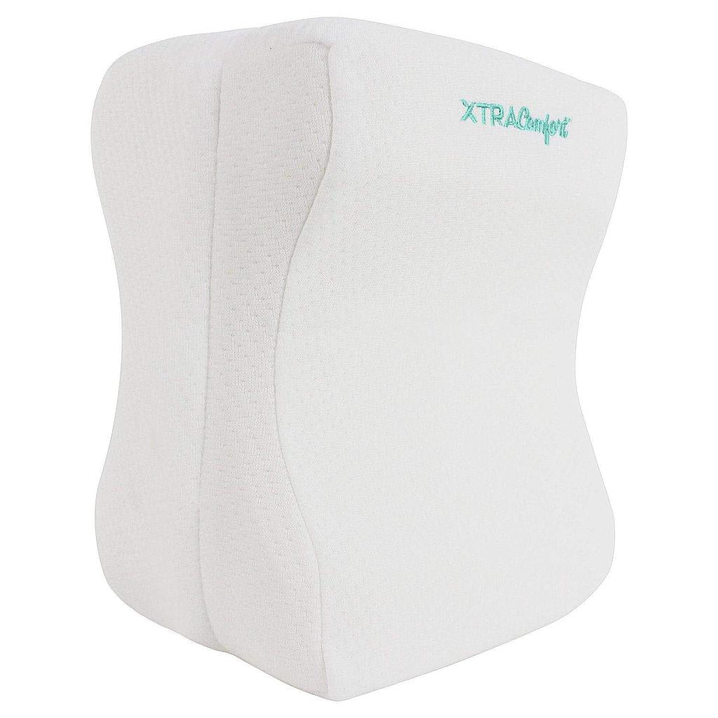 White wedge pillow with 'XTRA Comfort' branding on a white background