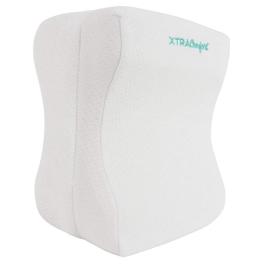White wedge pillow with 'XTRA Comfort' branding on a white background