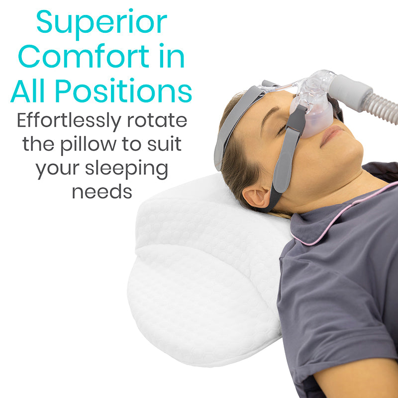 Person using a CPAP mask with a pillow, text about comfort and ease of use.