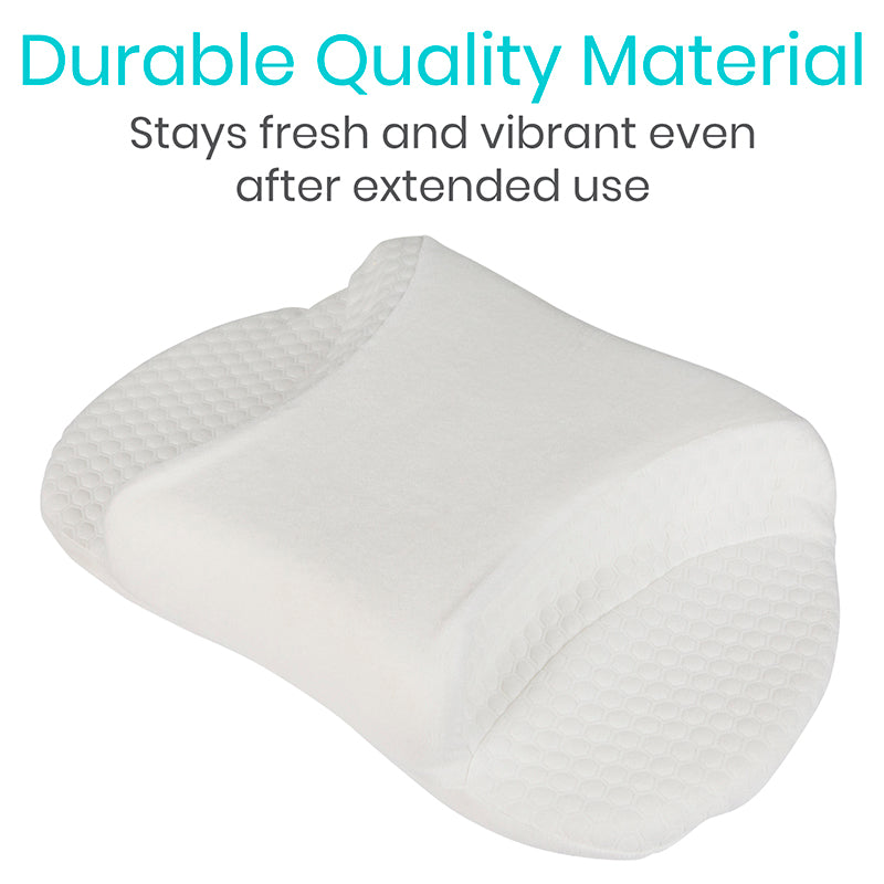 White pillow with text about durable quality material on a white background