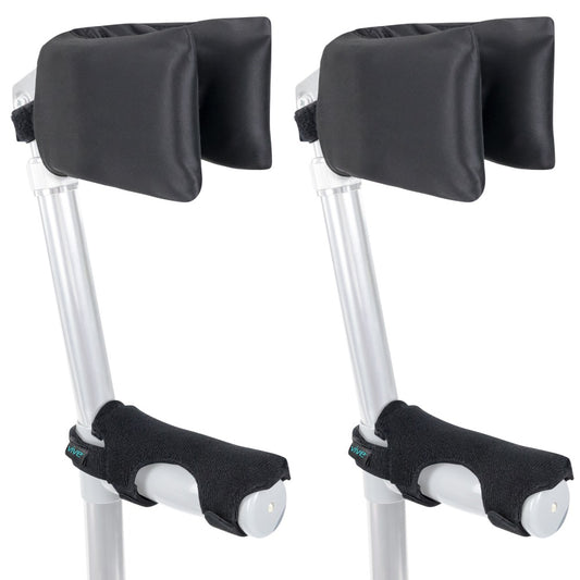 Pair of crutches with black arm pads and foot covers on a white background