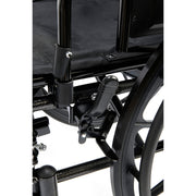 Close-up of a black wheelchair with visible components on a white background