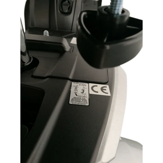 Close-up of a machine with a CE label on a white background