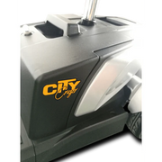 Close-up of a golf club with 'City Cruzer' branding on a white background