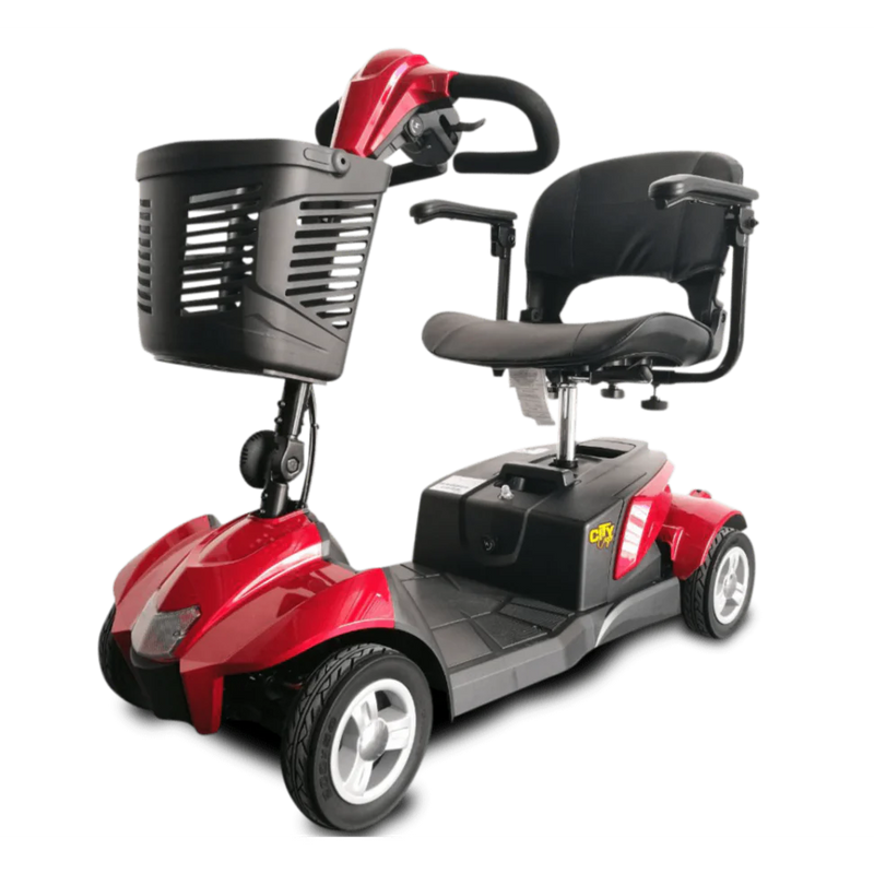Red and black mobility scooter with a basket on a white background