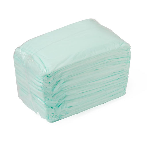 Stack of light blue disposable underpads on a white background