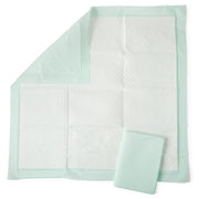 Mint green underpad with a folded corner on a white background