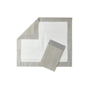 Folded gray and white fabric on a white background