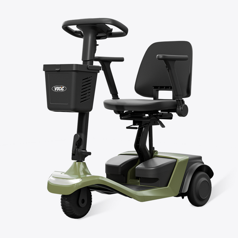 Green mobility scooter with a black seat and basket on a white background