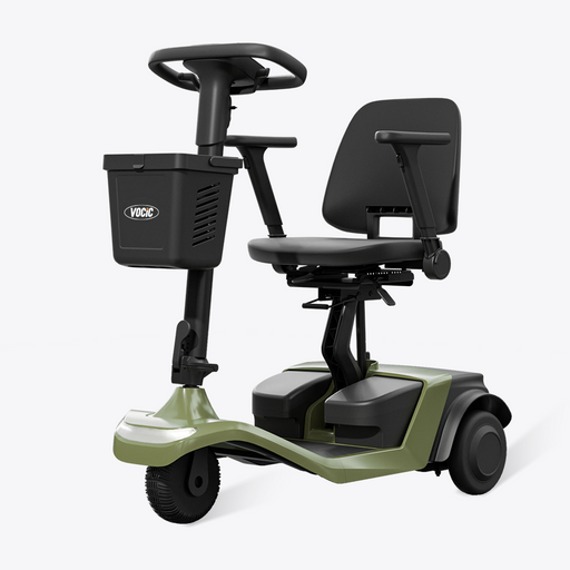 Green mobility scooter with a black seat and basket on a white background