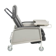 Medical examination table with wheels on a white background