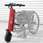 Red EZ Ride scooter attached to a wheelchair on a white background